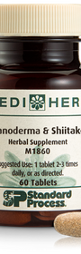 A bottle of Ganoderma & Shiitake herbal supplement next to a tablet.